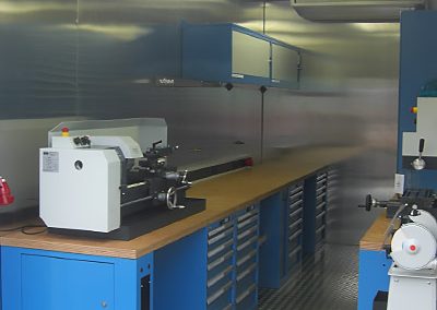 AWB workshop container with integrated lathe and bench grinder