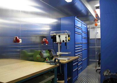 AWB workshop container - interior overview with workbench and drawers